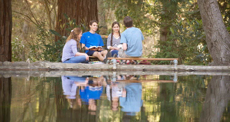 Students by the campus ponds