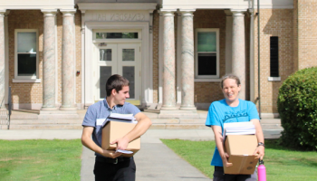Students retrieve packages from Kenarden Hall
